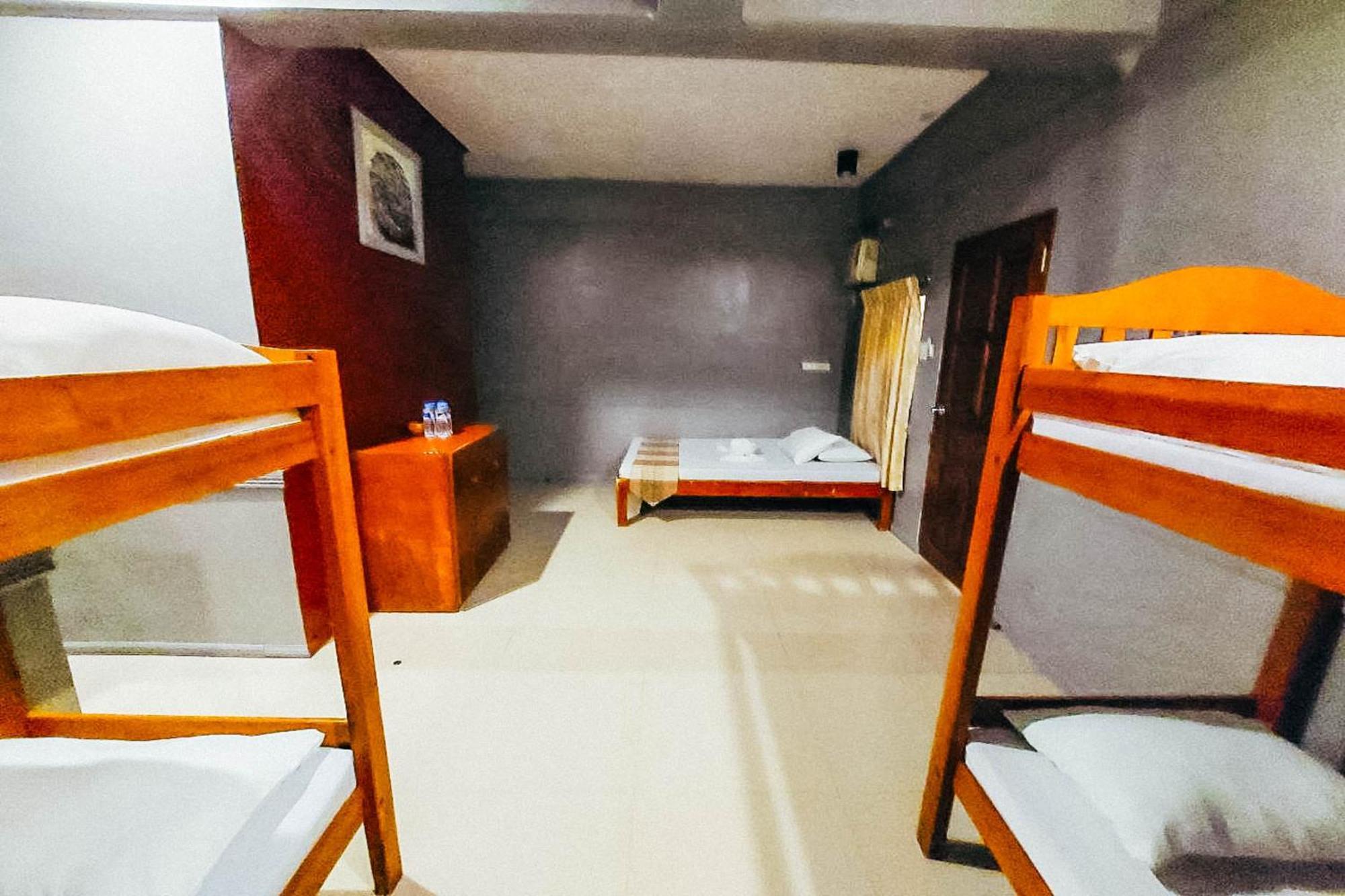 Mbg Travellers Inn Powered By Cocotel Пуэрто-Принцеса Номер фото