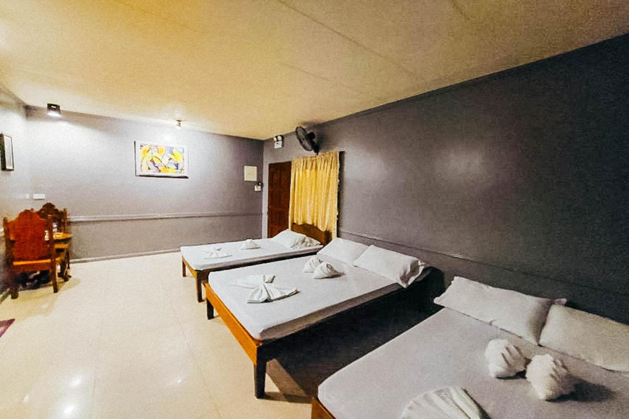 Mbg Travellers Inn Powered By Cocotel Пуэрто-Принцеса Номер фото