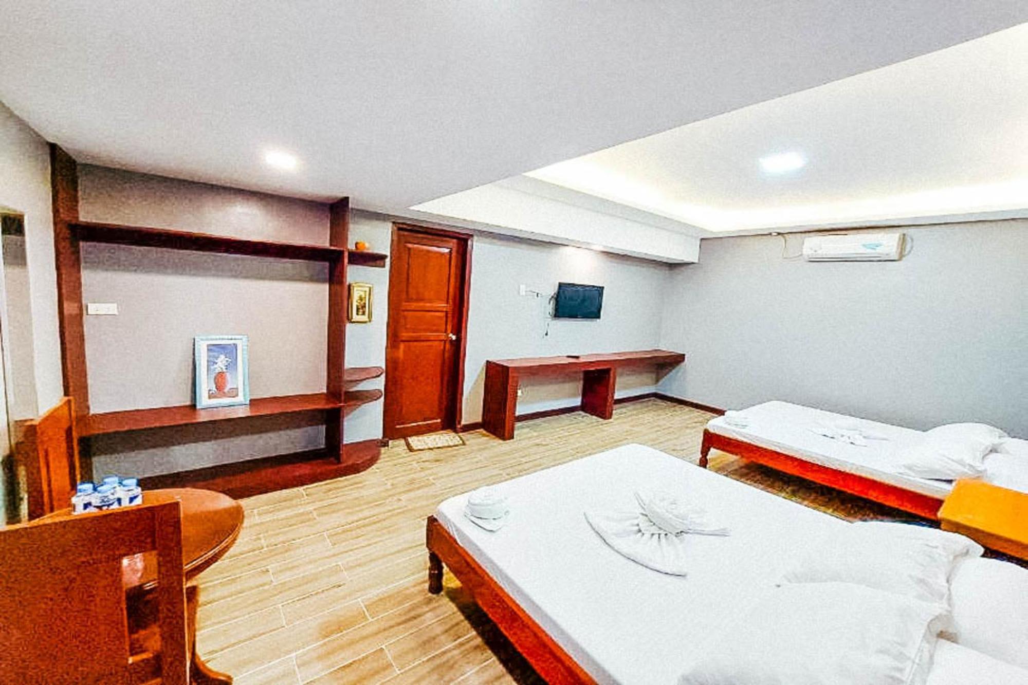 Mbg Travellers Inn Powered By Cocotel Пуэрто-Принцеса Номер фото