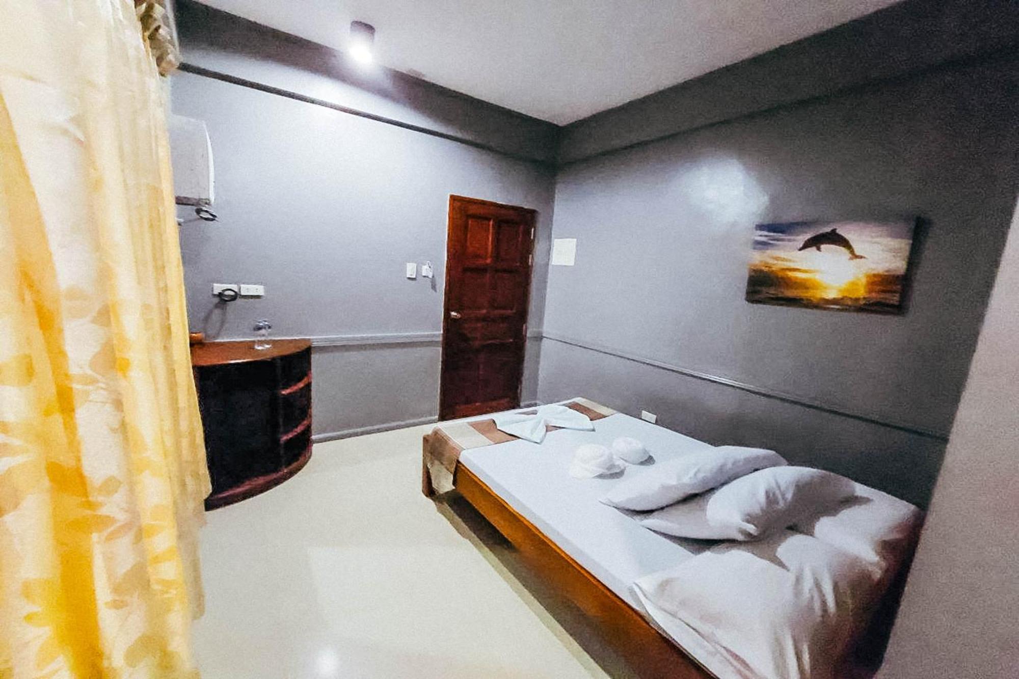 Mbg Travellers Inn Powered By Cocotel Пуэрто-Принцеса Номер фото