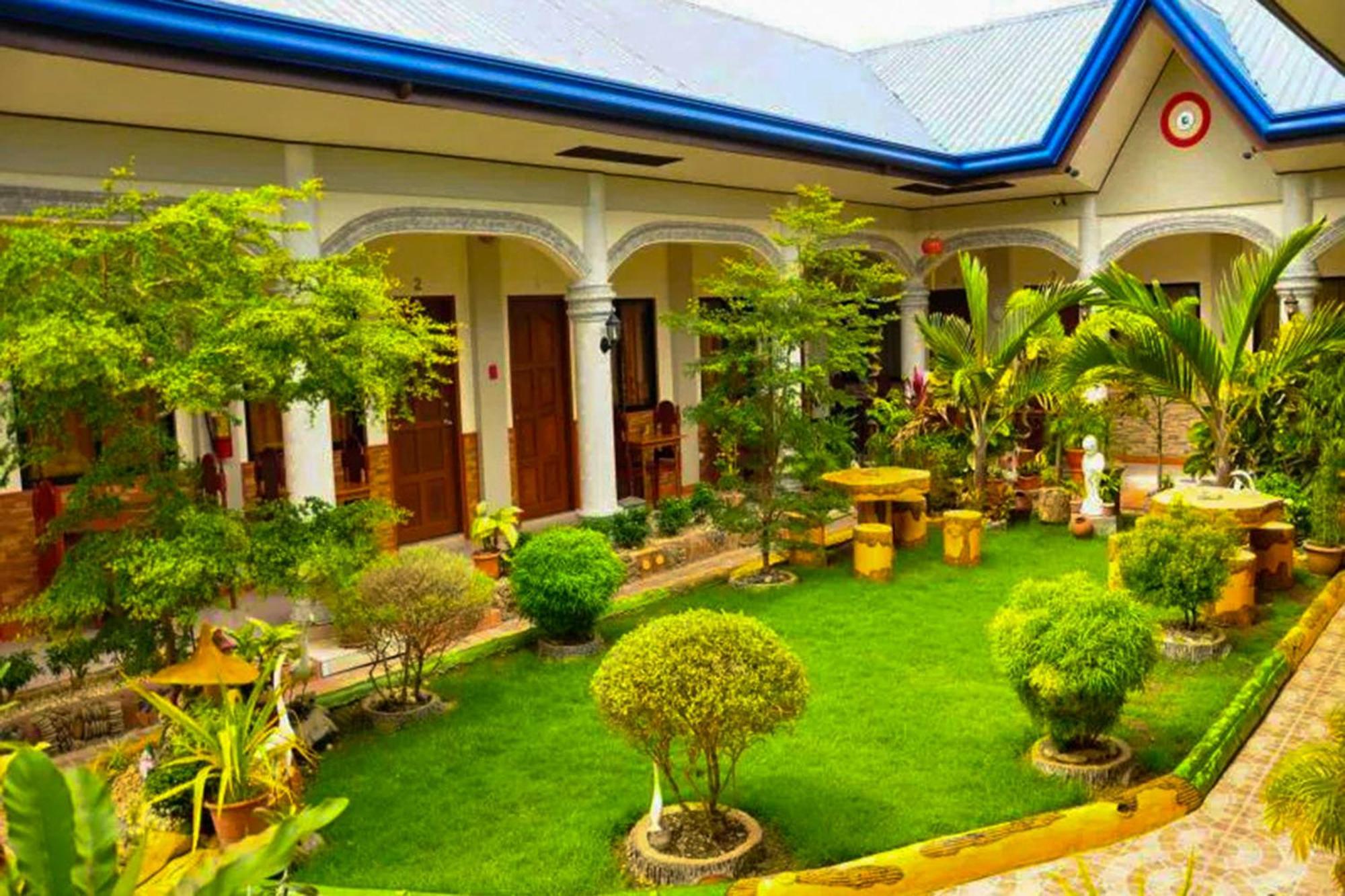 Mbg Travellers Inn Powered By Cocotel Пуэрто-Принцеса Экстерьер фото